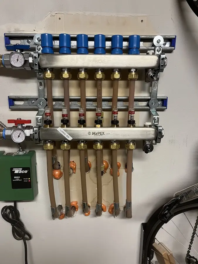 Plumber performing Water Heater Repair at a residential property in New Providence